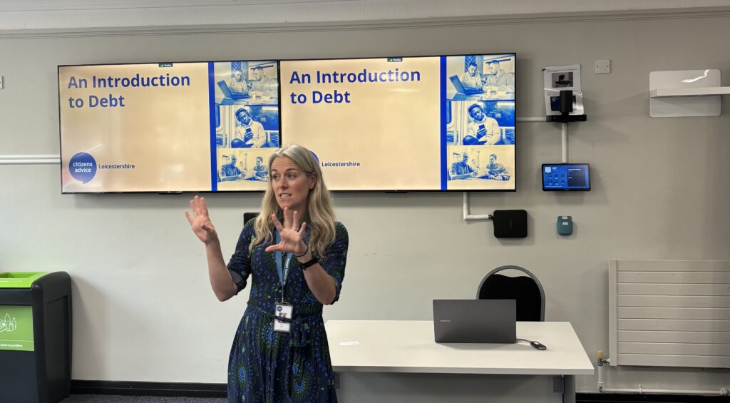 Melissa speaking at our "Introduction to Debt" course
