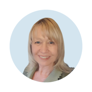A picture of CEO of Citizens Advice LeicesterShire, Vicky Gutteridge, who has short, blond hair on a blue circular background